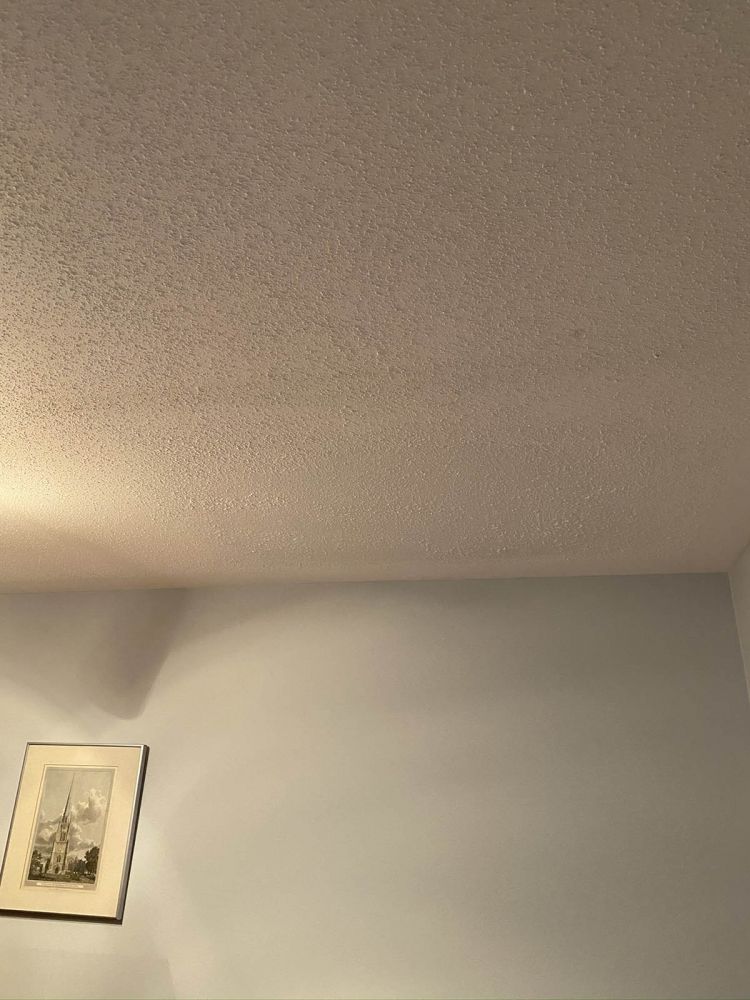 Popcorn ceiling drywall rain damage repair after pic 3