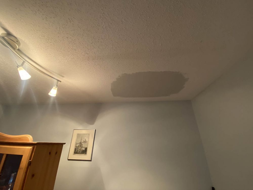 Popcorn ceiling drywall rain damage repair before pic 2